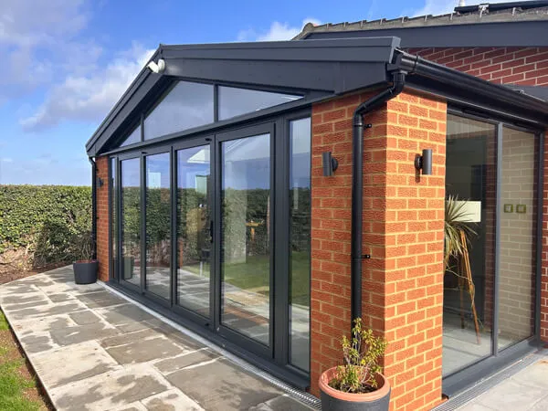Solid Roof Replacement Conservatory With Bi-Folding Doors In Wallingford